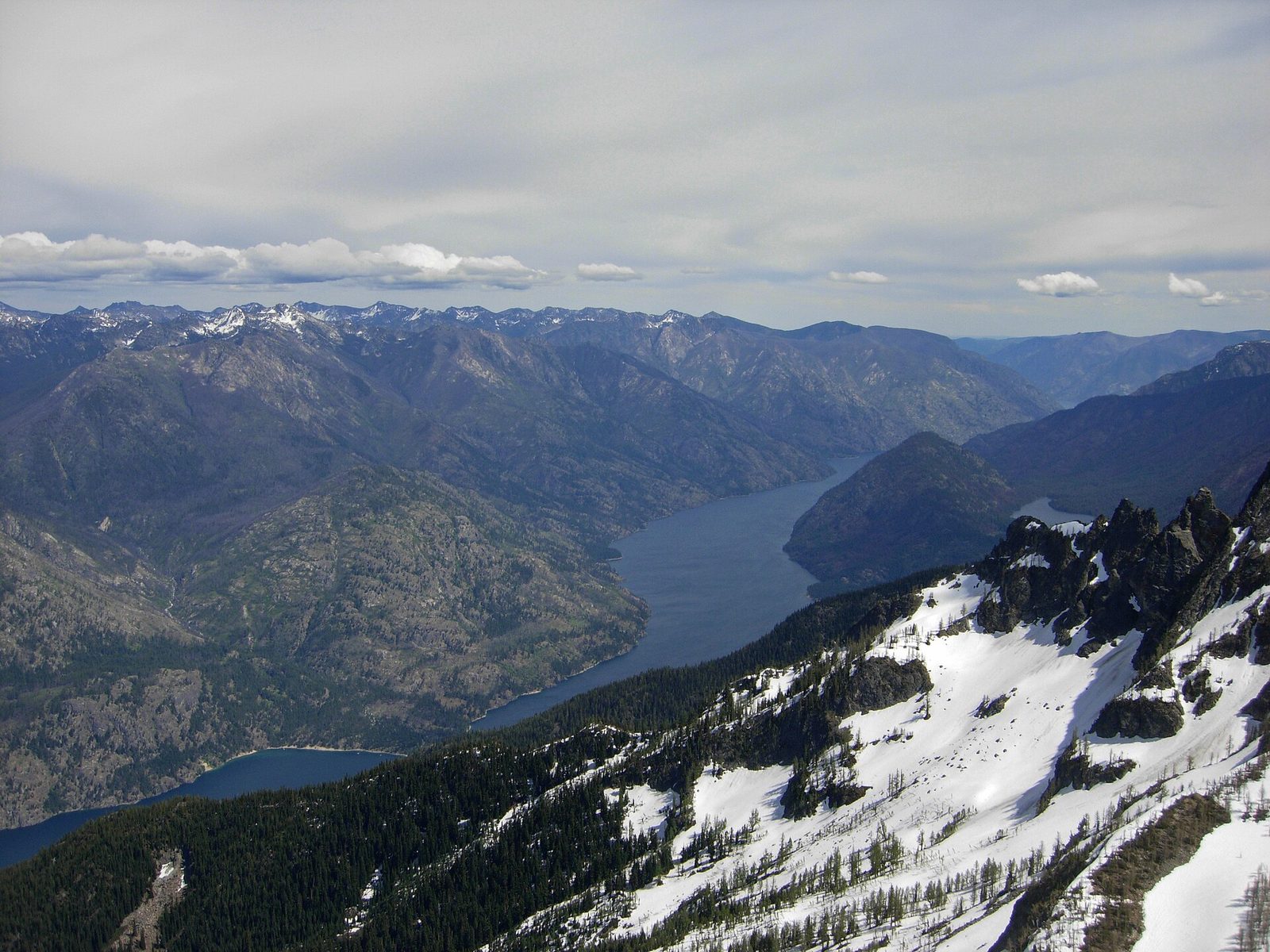 Lake Chelan winding between forested mountains, seen from Castle Rock
