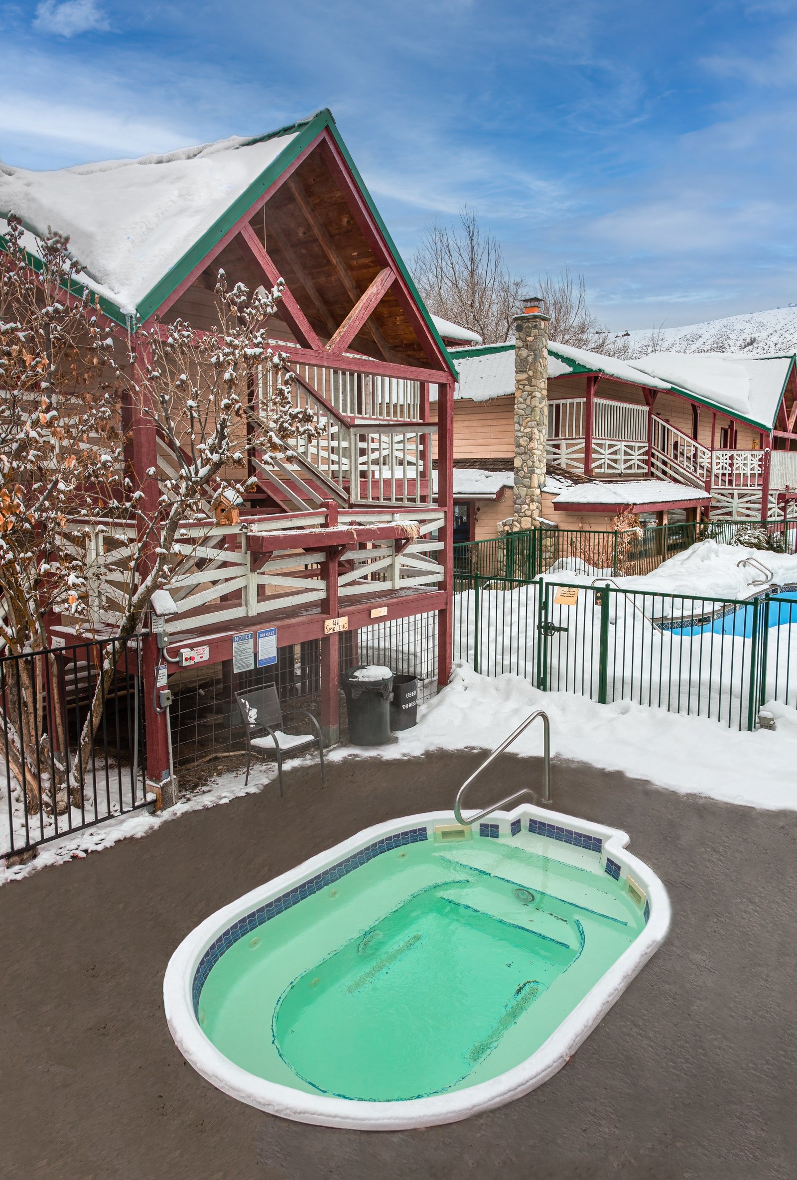 Hot tub and barrel sauna in winter